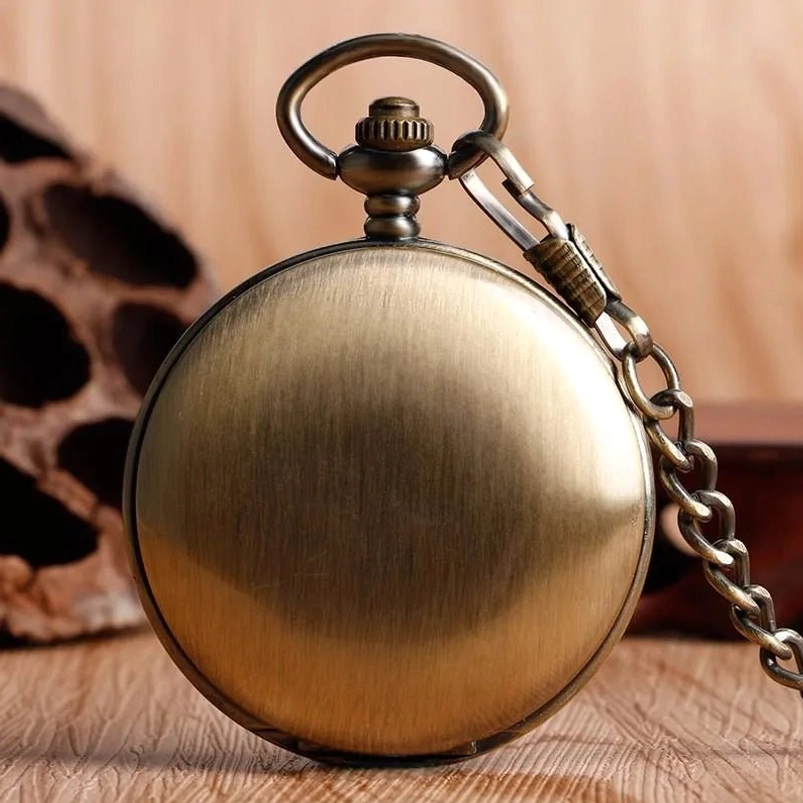 Closed hunter-case steampunk pocket watch rear view with brushed bronze smooth metal surface and attached chain