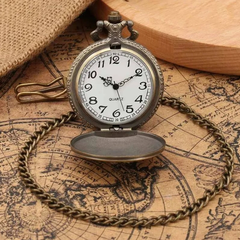 Open steampunk pocket watch interior showing white dial with black numerals, bronze metal case, quartz movement, chain attached, vintage map and burlap styling