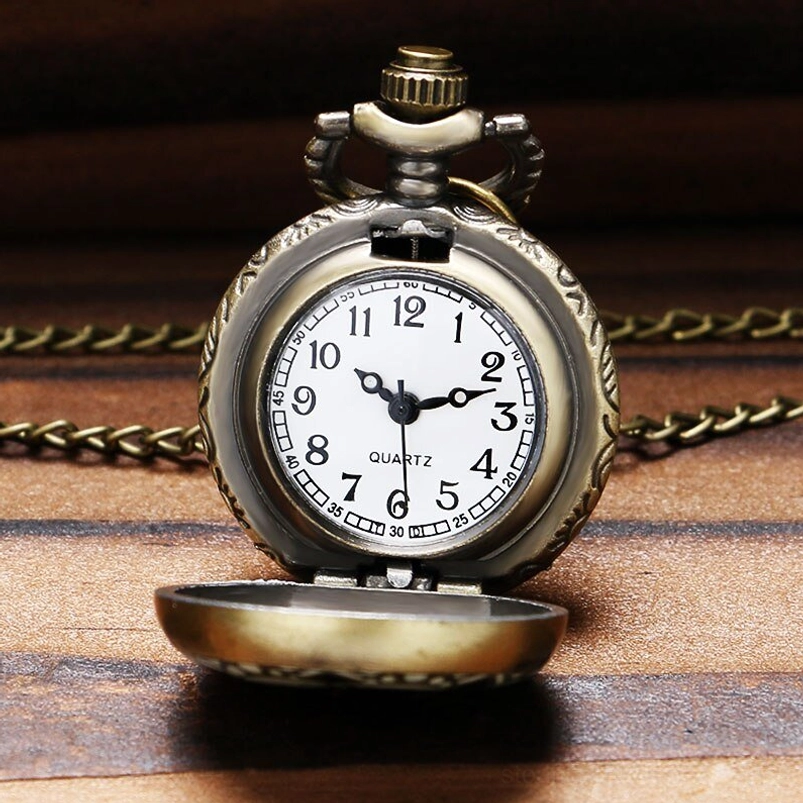 Opened quartz pocket watch mechanism with Arabic numeral dial and bronze metal case