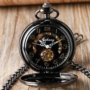 Opened Steampunk pocket watch revealing skeleton movement with exposed golden gears and black dial with Arabic numerals - mechanical movement display