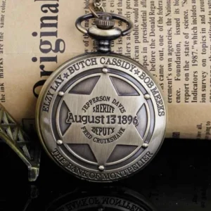 Vintage bronze steampunk pocket watch with sheriff star embossed on back cover, displayed on vintage newspaper backdrop