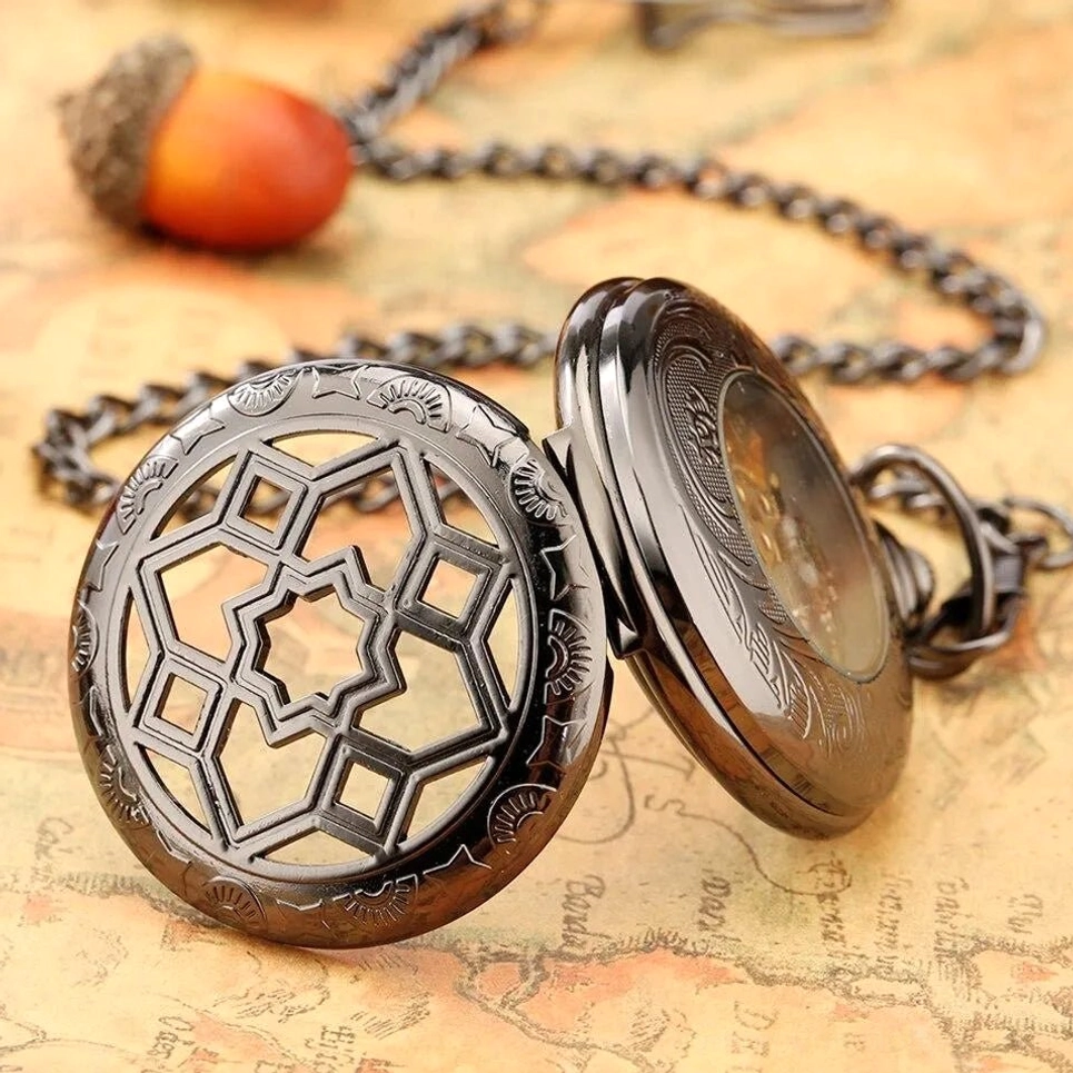 Side view of flip-style mechanical pocket watch showing geometric hollowed front cover and attached metal chain