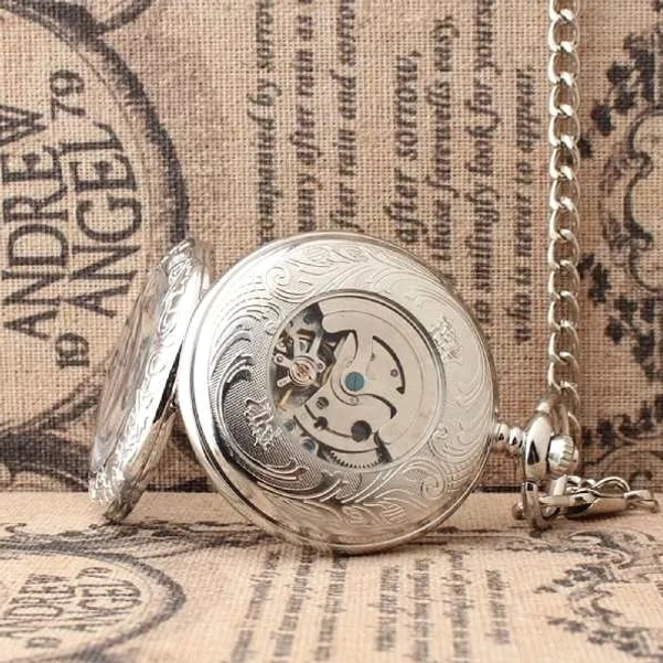 Skeleton back steampunk pocket watch showing visible mechanical movement gears and metal chain attachment