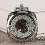 Victorian skeleton steampunk pocket watch front view with roman numeral dial and exposed gear mechanism on textured book background