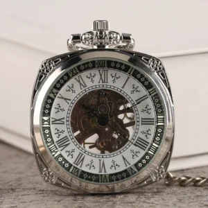 Victorian skeleton steampunk pocket watch front view with roman numeral dial and exposed gear mechanism on textured book background