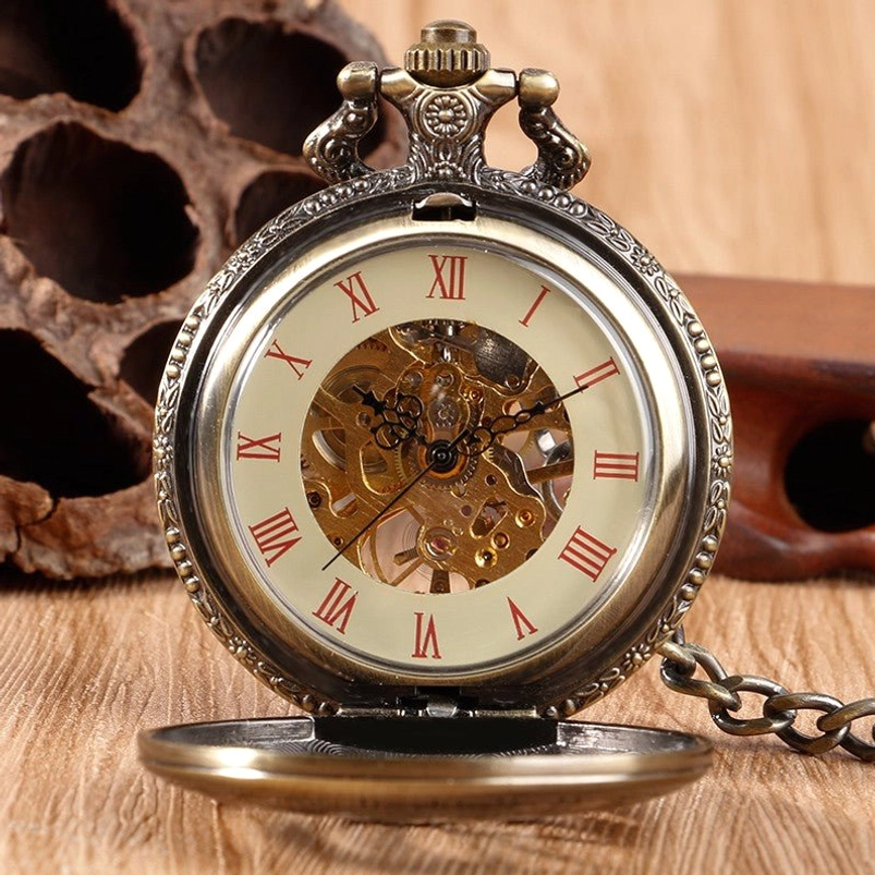 Open steampunk pocket watch revealing exposed mechanical movement with red Roman numeral dial, bronze finish demonstrating skeleton watch craftsmanship