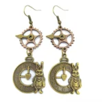 Bronze steampunk rabbit pocket watch drop earrings with gear charms and ornate dial on white background