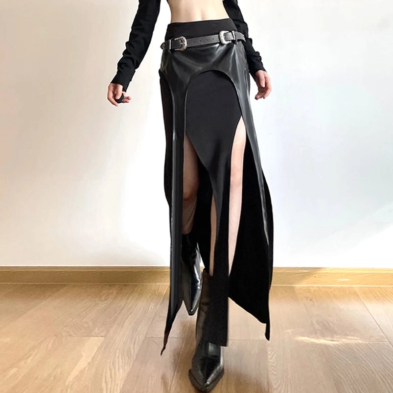 Black cutout steampunk rave skirt low angle front showing mixed fabric construction and asymmetric slits