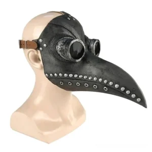 Mannequin wearing steampunk plague doctor mask with black distressed leather finish, silver rivets, brown adjustable strap, and prominent raven beak - left three-quarter profile