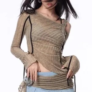 Steampunk off-shoulder top front straight view showing asymmetric curved hem, khaki ribbed fabric texture, and leather shoulder strap detail