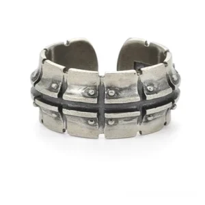 Adjustable sterling silver steampunk open cuff ring featuring dark contrasting inlays and rivet decorative elements, direct front view on white background
