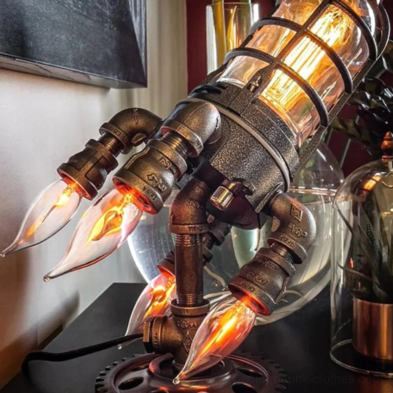 Low side angle view of dark metal steampunk rocket lamp with multiple Edison flame bulbs and detailed gear base on indoor desktop
