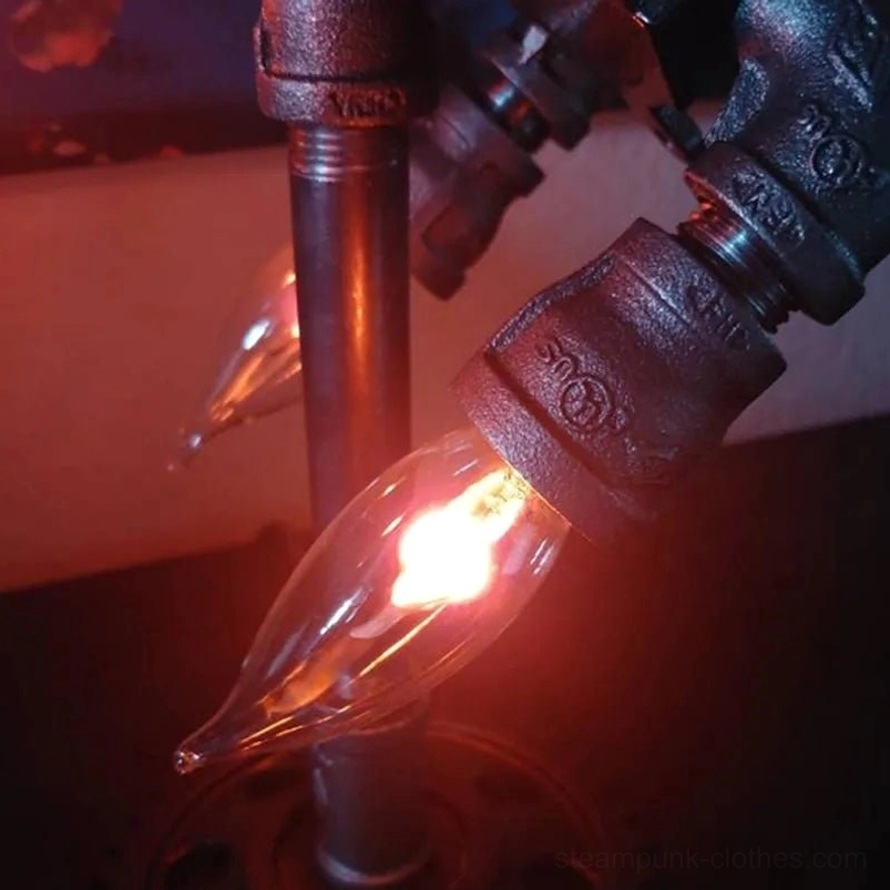 Macro close-up of steampunk rocket lamp joint and aged red-brown metal lit flame bulb showing intricate metalwork and vintage patina