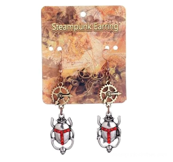 Antique bronze steampunk scarab beetle earrings with gear charm on branded product packaging