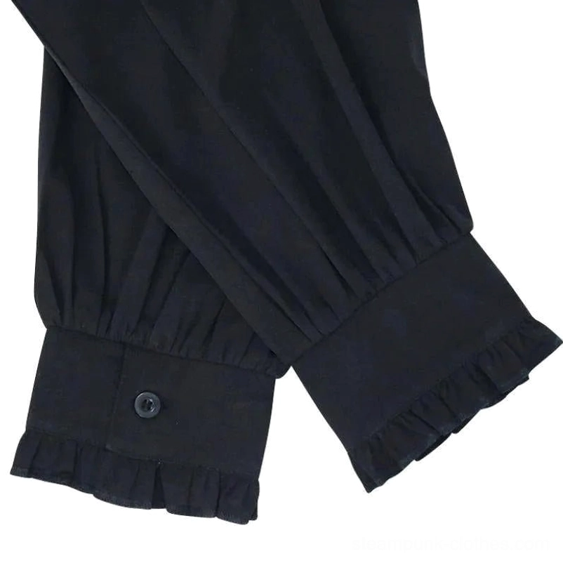 Detailed close-up of steampunk shirt ruffled bishop cuff with button closure, black fabric, and precision pintuck sleeve detailing showing tailoring quality