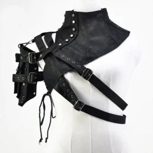 Female mannequin displaying black asymmetrical steampunk shoulder armor with crisscross straps, metal hardware, drawstring details, and functional utility pouches, front view
