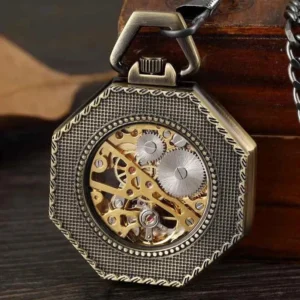 Steampunk skeleton pocket watch close-up showing engraved bronze case texture, polished brass movement, and braided decorative edge detail