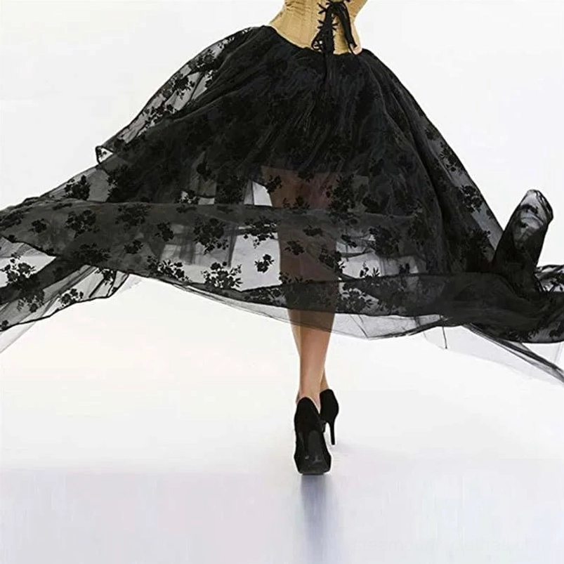 Black steampunk high-low skirt back view showing lace-up corset design and sheer mesh flowing hemline
