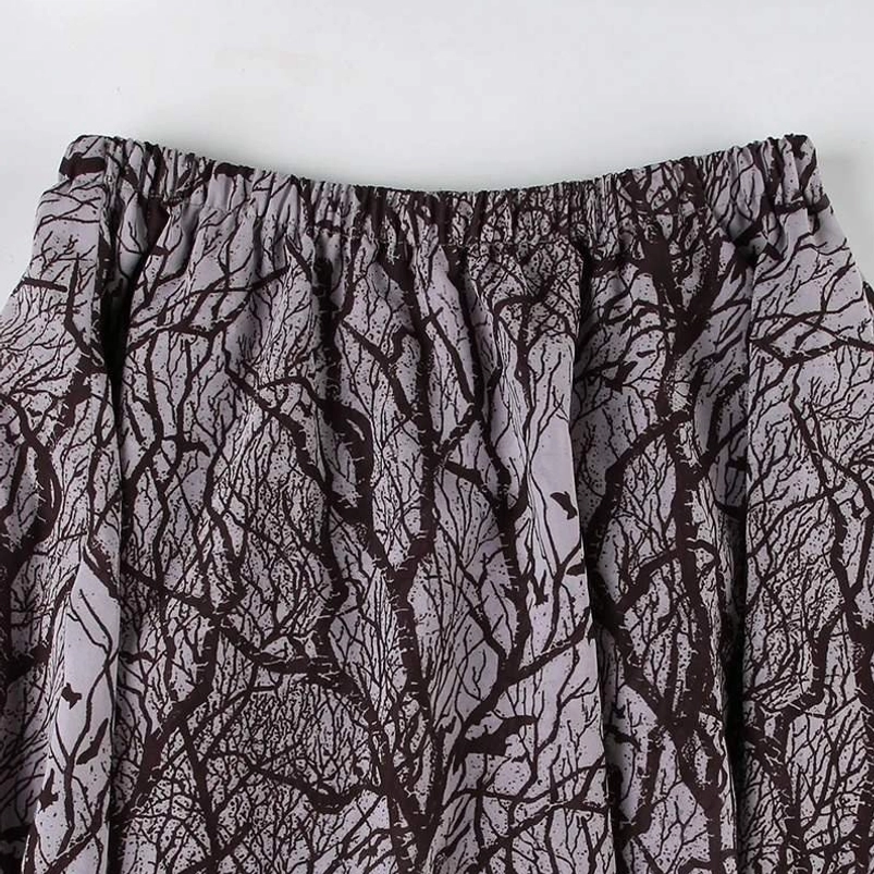 Elastic waistband detail of steampunk skirt featuring printed bare branch pattern on tree branch fabric with textured weave