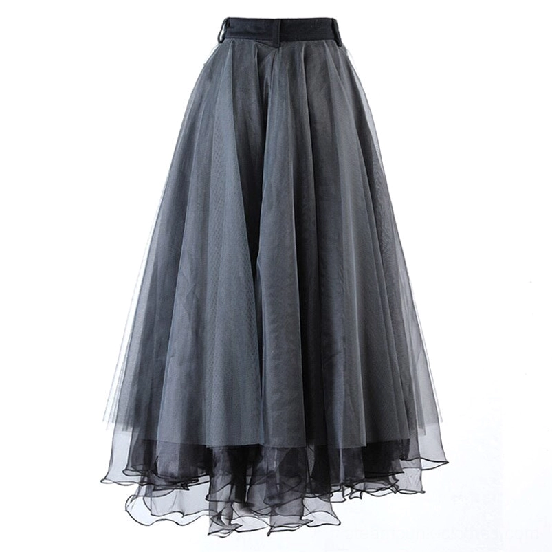 Two-tier dark grey tulle mesh layer detail of steampunk skirt showing wavy uneven hemline construction