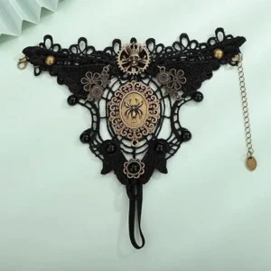 steampunk spider gloves flat lay overhead view showing elastic wrist strap and vintage bronze decorative details