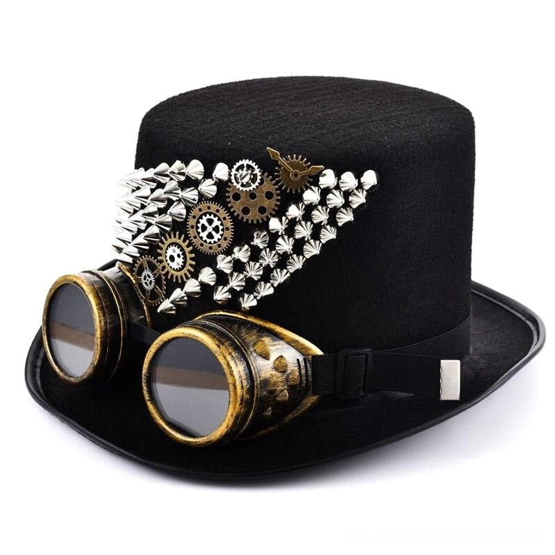 Black steampunk spike top hat with silver metal spike trim and brass gear ornaments, shown from left front angle with integrated brass goggles, studio shot with white background
