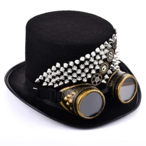 Steampunk spike top hat featuring full silver spike band and brass gear details, photographed from right front angle with attached brass goggles, plain white studio backdrop