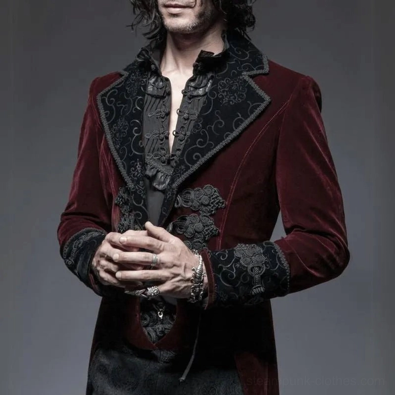 Steampunk tailcoat close-up detail of ornate lapel embroidery ruffled shirt and hand jewelry