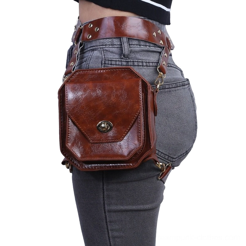 Steampunk leather thigh bag worn on gray denim jeans, rear view displaying back profile and secure hip attachment point for versatile wearing configurations