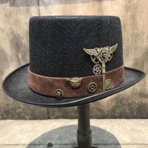 Steampunk top hat with bronze mechanical gears and winged key ornament displayed on wooden stand, front view showing intricate metal details and black felt construction