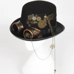 Steampunk top hat with brass goggles front view on mannequin head - black felt fabric with bronze gears and chain decorations