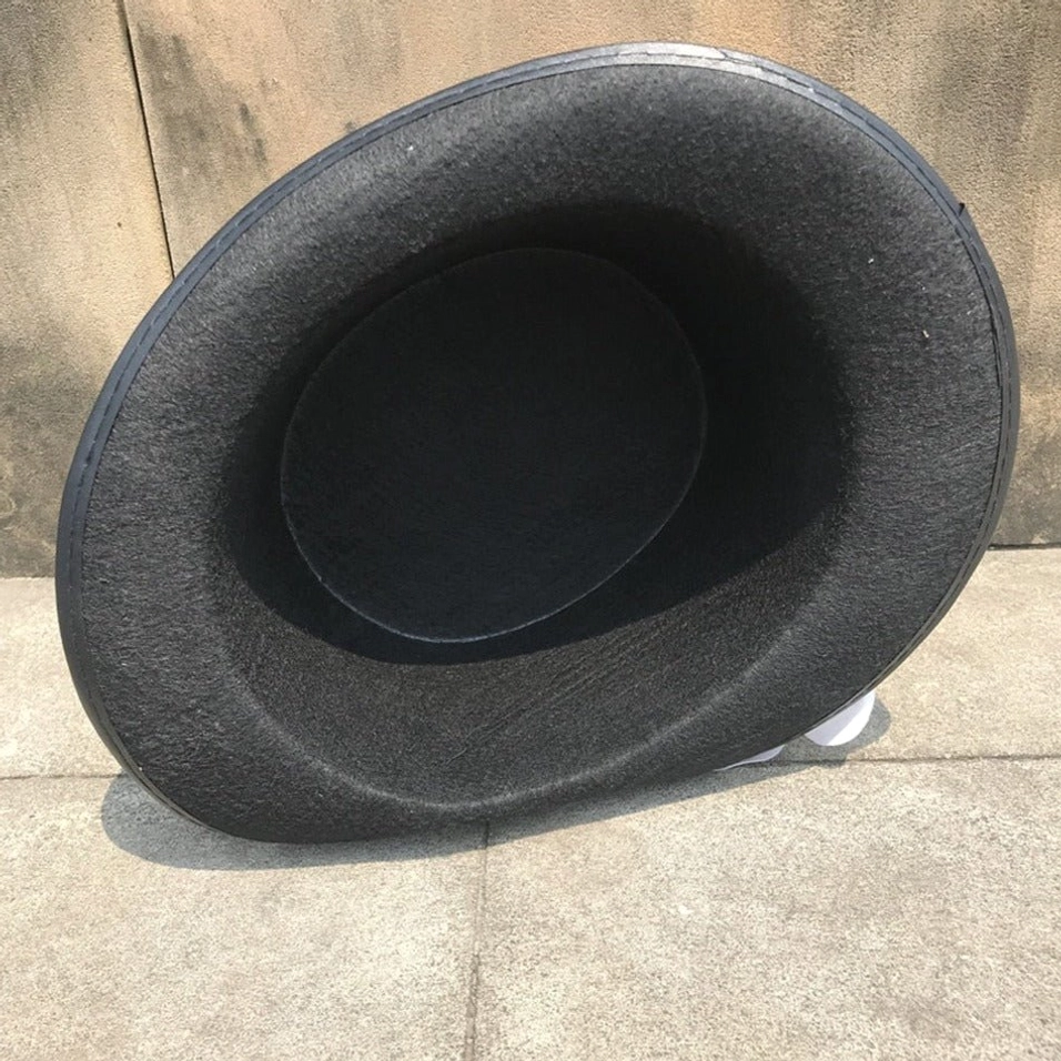 Steampunk top hat interior overhead view showing plain black felt lining, smooth rounded brim construction, and quality craftsmanship details