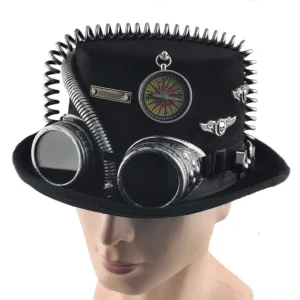 Steampunk hat worn on male mannequin head showing front angle with rivet trim, functional goggles, compass and metal badges