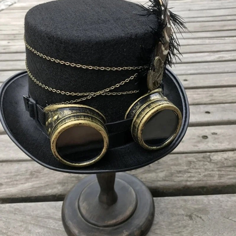 Steampunk top hat right rear perspective, brass goggles, adjustable strap, gear badge and feather decoration visible