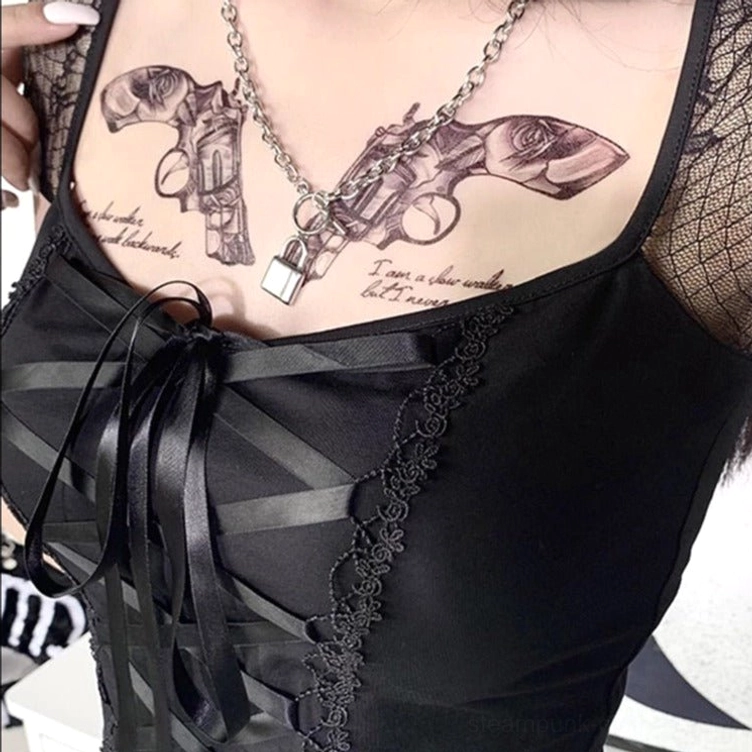 Close-up detail of satin ribbon corset lacing, rose lace trim, and scalloped edge on gothic steampunk top