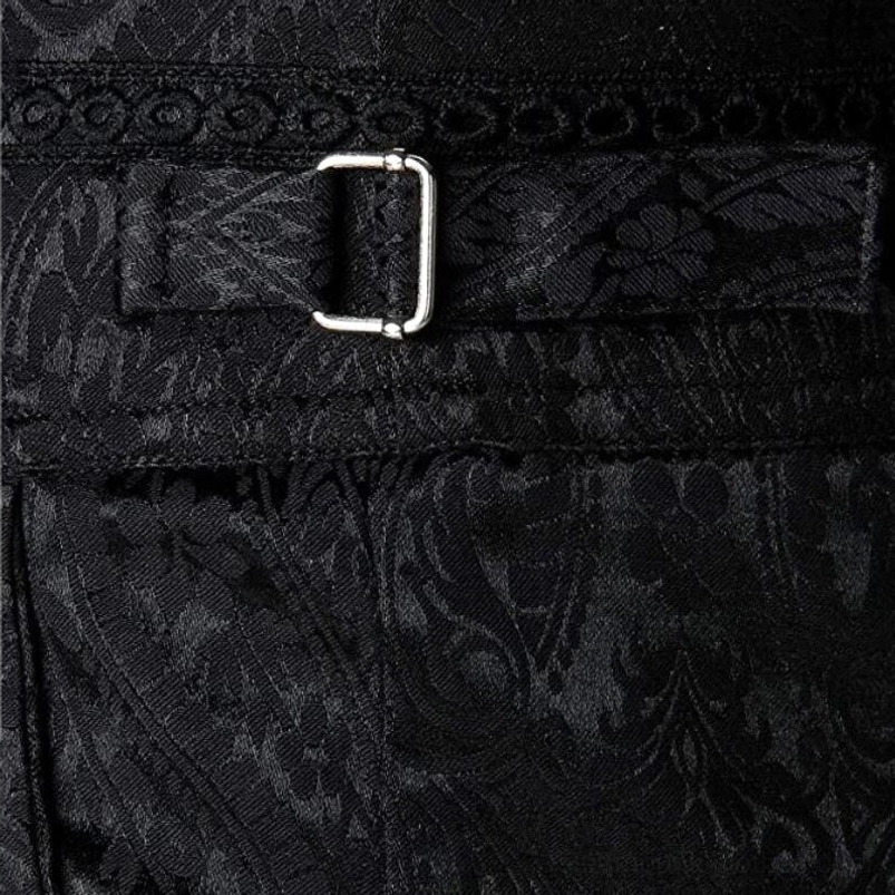Men's steampunk pants side waist adjuster detail close-up, silver metal buckle strap, black damask jacquard fabric, functional design element