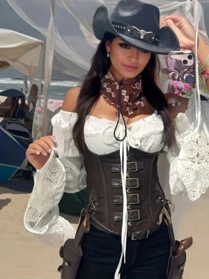 Brown steampunk corset worn outdoors on model paired with cowboy outfit, front lace-up and buckle styling
