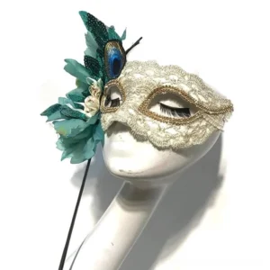 Venetian steampunk masquerade mask featuring peacock ornaments, lace detailing, gold edging and false lashes, displayed in front three-quarter view on white background