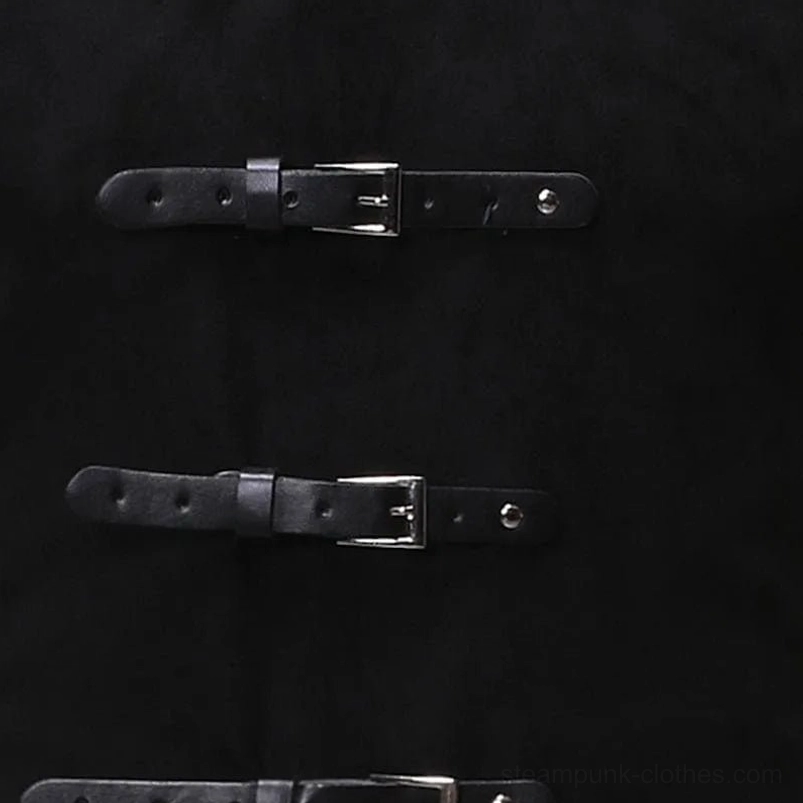 Gothic steampunk vest buckle closure detail showing black leather straps, silver buckles and rivet fasteners