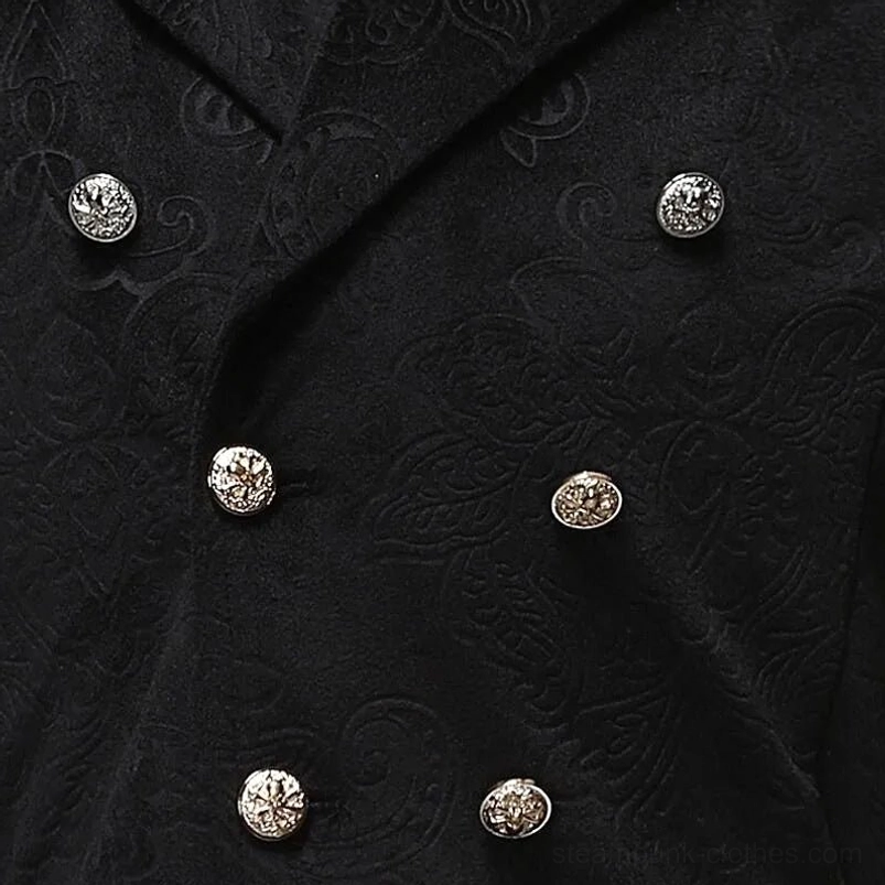 Steampunk vest front detail close-up showcasing embossed paisley jacquard pattern and ornate metal button hardware