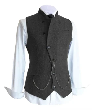 Men's dark grey steampunk vest with industrial metal chain and stand collar on mannequin, steampunk waistcoat alternative fashion