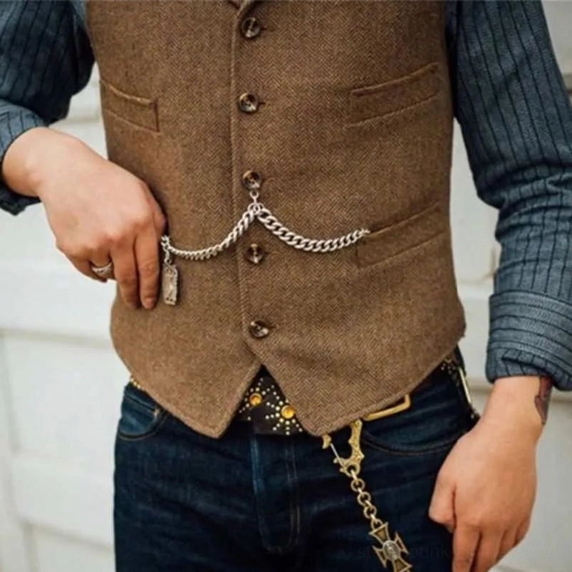 Steampunk wool waistcoat close-up front showing dual flap pockets and metal waist chain detail