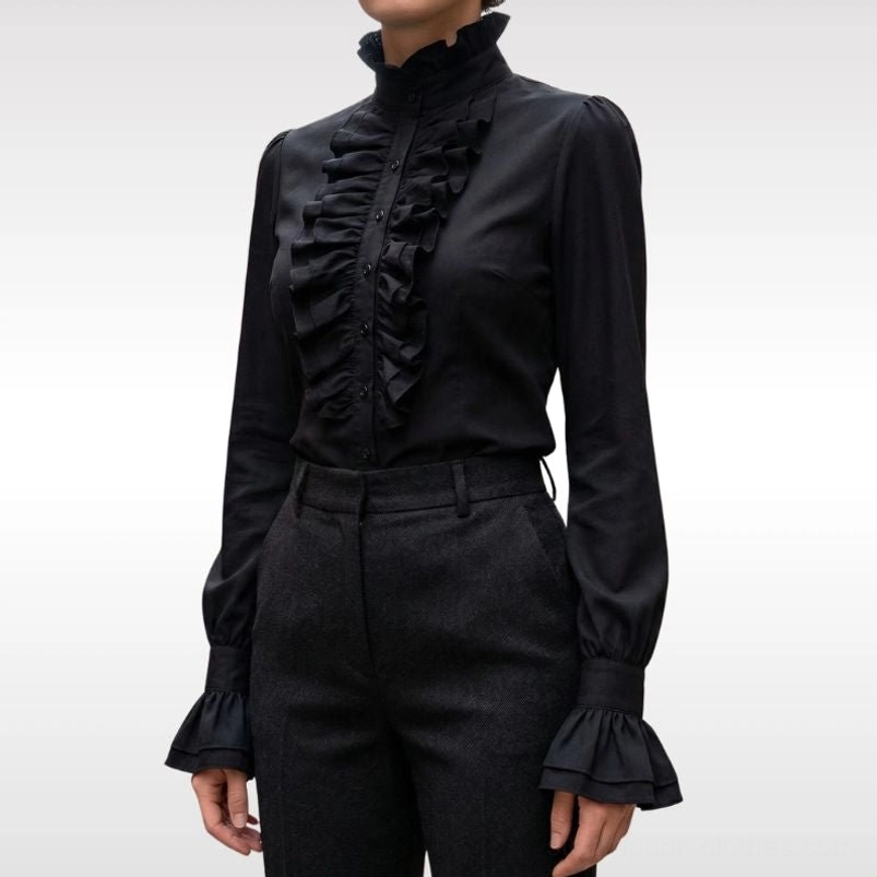 black steampunk victorian ruffled stand collar blouse with flared ruffled cuffs partial torso studio view