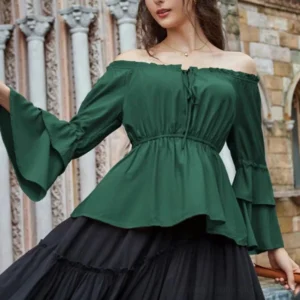 Dark green steampunk blouse with off-shoulder elastic neckline and layered ruffle cuffs, worn by model in front three-quarter view at outdoor medieval stone architecture