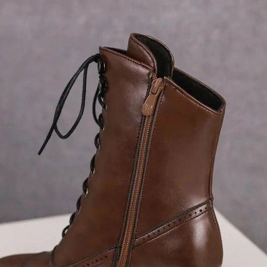 Steampunk lace-up ankle boot with crossed lacing and metal eyelets - detailed side view showing heel height and crossed lace pattern