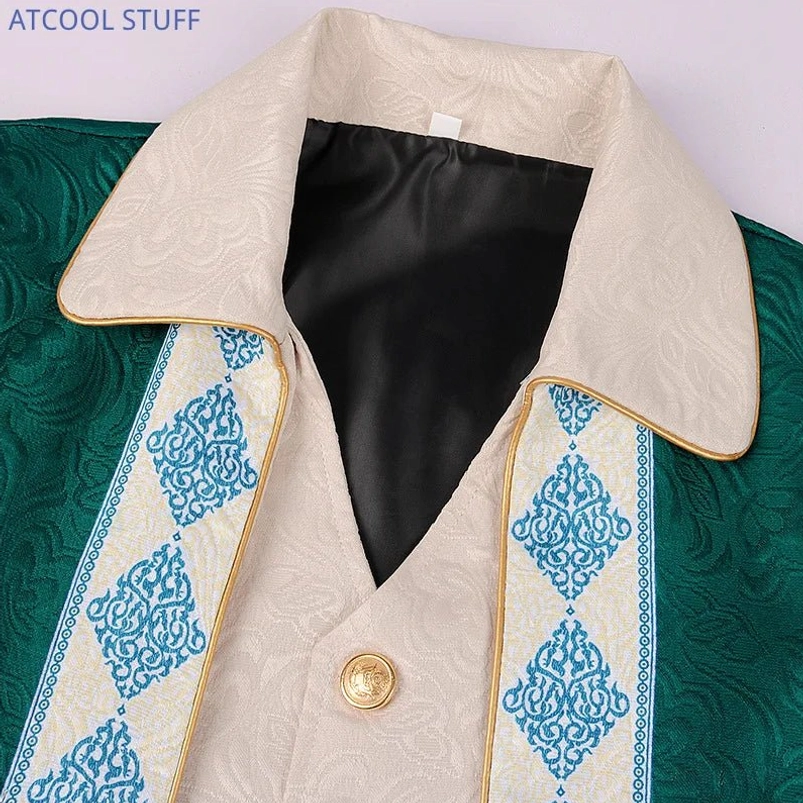 Close-up detail of green Victorian steampunk jacket collar lapel with beige trim and blue embroidered patterns