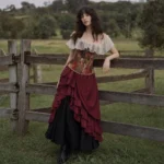 Steampunk Victorian long maxi skirt with layered ruffled front design, two-tone color blocking, high-waist construction, worn by female model outdoors
