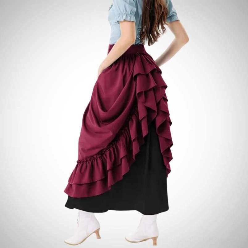 Steampunk Victorian asymmetrical ruffled maxi skirt, side rear three-quarter view showing draped side layer, black underlayer, high waist design