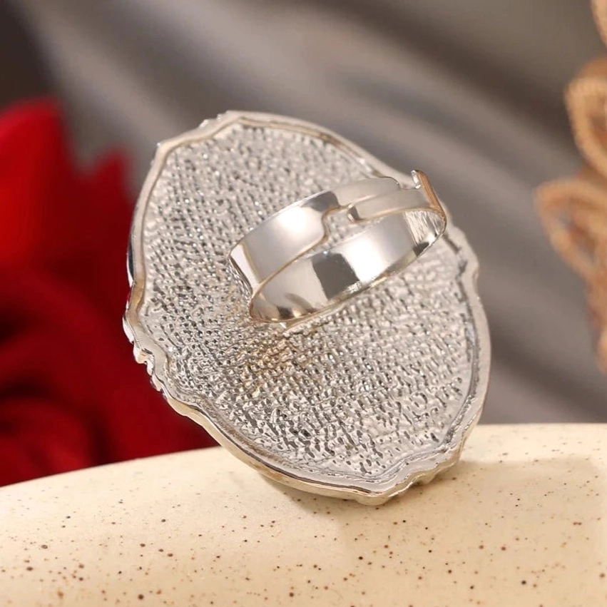 Black enamel cameo ring back view - engraved textured backplate with adjustable silver band