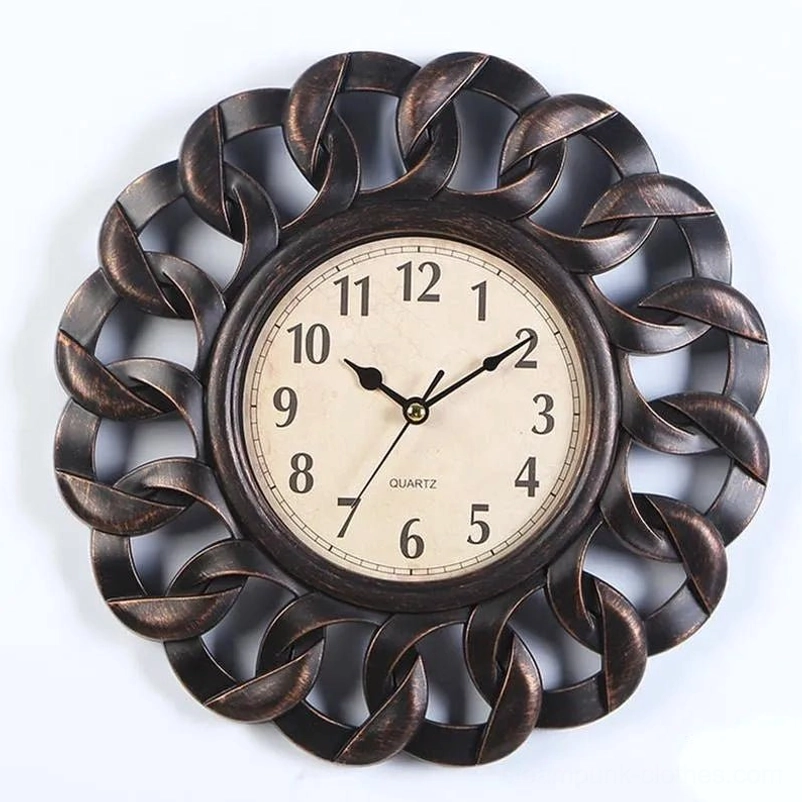 Dark bronze steampunk clock with ornate flower border, classic Arabic numeral dial, and weathered industrial finish